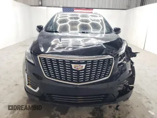 2023 Cadillac XT5 FWD Premium Luxury with VIN 1GYKNCRS6PZ171335, listed as a Copart auction lot 51859385 with 52,691 mi miles and Clean Title. Bid and sale history available at carsss.com. Image 5.
