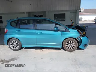 2013 Honda Fit Sport z VIN JHMGE8H54DC026019, wystawiony jako IAAI lot #42125500 z przebiegiem 139 285 mil mil oraz . Historia ofert i sprzedaży dostępna na DreamBid. Obrazek 13.