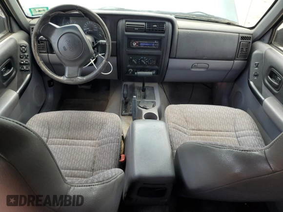 1998 Jeep Cherokee Sport with VIN 1J4FJ68S6WL215447, listed as a Copart auction lot 65186505 with 177,682 mi miles and Clean title. Bid and sale history available at DreamBid. Image 8.