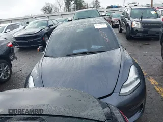 2019 Tesla Model 3 Mid Range with VIN 5YJ3E1EA3KF426971, listed as a IAAI auction lot 41564939 with Not Provided miles and . Bid and sale history available at carsss.com. Image 12.