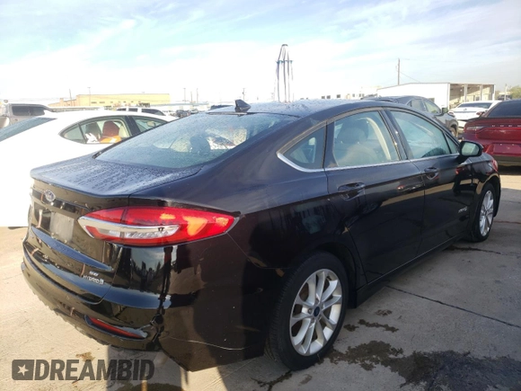 2019 Ford Fusion Hybrid SE with VIN 3FA6P0LU4KR141294, listed as a Copart auction lot 65058972 with 96,211 mi miles. Bid and sale history available at carsss.com. Image 3.
