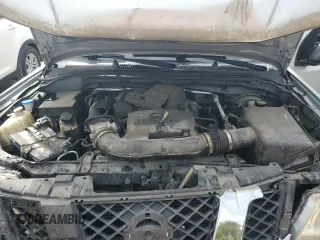 2010 Nissan Frontier SE z VIN 1N6AD0CWXAC433542, wystawiony jako Copart lot #54624735 z przebiegiem 61 232 mil mil oraz Szkoda całkowita • Salvage title. Historia ofert i sprzedaży dostępna na DreamBid. Obrazek 11.