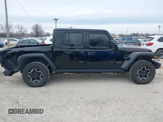 2022 Jeep Gladiator Rubicon with VIN 1C6JJTBG7NL145501, listed as a IAAI auction lot 41506842 with 20,593 mi miles and . Bid and sale history available at DreamBid. Image 13.