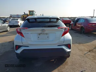 2021 Toyota C-HR LE with VIN JTNKHMBXXM1099019, listed as a IAAI auction lot 41525170 with 63,519 mi miles. Bid and sale history available at carsss.com. Image 16.