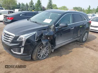 2018 Cadillac XT5 Luxury AWD with VIN 1GYKNDRSXJZ247863, listed as a IAAI auction lot 42392404 with 96,629 mi miles and . Bid and sale history available at DreamBid. Image 2.