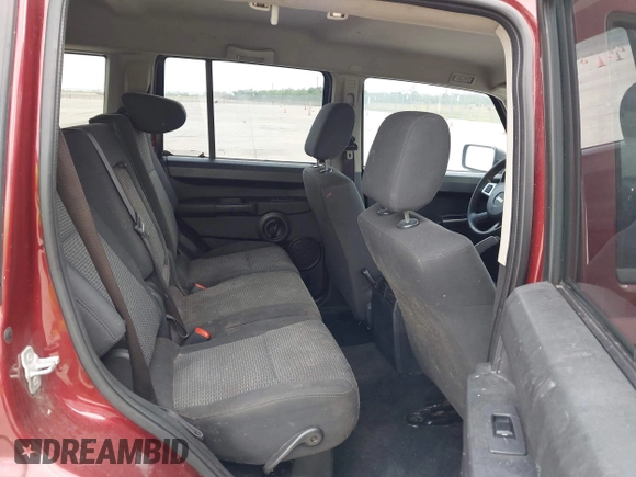 2008 Jeep Commander Sport z VIN 1J8HG48K48C175446, wystawiony jako IAAI lot #42206365 z przebiegiem 199 996 mil mil oraz . Historia ofert i sprzedaży dostępna na DreamBid. Obrazek 8.