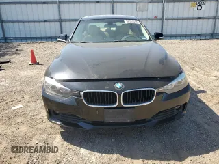 2015 BMW 3 Series 320i xDrive with VIN WBA3C3G57FNS74781, listed as a Copart auction lot 52324455 with 131,924 mi miles and Salvage title. Bid and sale history available at DreamBid. Image 5.