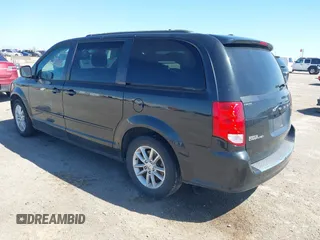 2016 Dodge Grand Caravan SXT with VIN 2C4RDGCG0GR387856, listed as a IAAI auction lot 41769163 with 103,856 mi miles and . Bid and sale history available at DreamBid. Image 3.