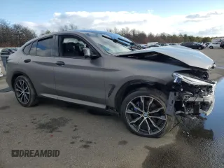 2021 BMW X4 M40i z VIN 5UX2V5C08M9F52562, wystawiony jako Copart lot #83665674 z przebiegiem Nie podano mil oraz Szkoda całkowita • Salvage title. Historia ofert i sprzedaży dostępna na DreamBid. Obrazek 4.