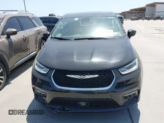 2023 Chrysler Pacifica Hybrid Touring L z VIN 2C4RC1L77PR540958, wystawiony jako IAAI lot #42010484 z przebiegiem 61 166 mil mil oraz . Historia ofert i sprzedaży dostępna na DreamBid. Obrazek 12.