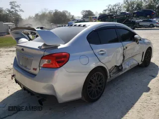2015 Subaru WRX STI z VIN JF1VA2L67F9804241, wystawiony jako Copart lot #42649583 z przebiegiem 94 386 mil mil oraz . Historia ofert i sprzedaży dostępna na DreamBid. Obrazek 3.