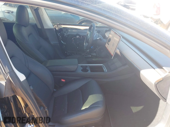 2023 Tesla Model 3 Long Range with VIN 5YJ3E1EB6PF634116, listed as a IAAI auction lot 41814670 with 47,801 mi miles and . Bid and sale history available at DreamBid. Image 5.