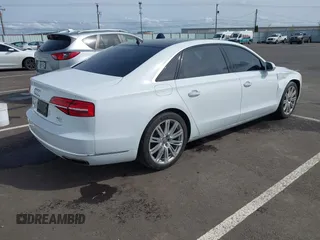 2015 Audi A8 4.0T with VIN WAU32AFD6FN039739, listed as a IAAI auction lot 41946401 with 102,668 mi miles and . Bid and sale history available at DreamBid. Image 4.