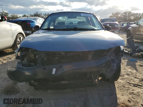 1999 Ford Escort SE z VIN 1FAFP13P8XW292868, wystawiony jako Copart lot #78498564 z przebiegiem 154 668 mil mil oraz Nie do naprawy • Non repairable. Historia ofert i sprzedaży dostępna na DreamBid. Obrazek 5.