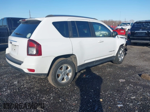 2014 Jeep Compass Altitude with VIN 1C4NJCBA4ED775315, listed as a IAAI auction lot 41429259 with 148,064 mi miles. Bid and sale history available at carsss.com. Image 4.