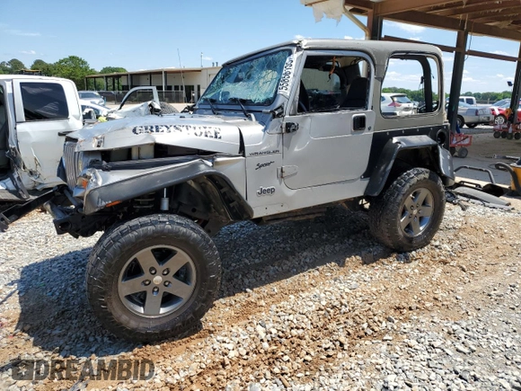 2002 Jeep Wrangler Sport with VIN 1J4FA49S42P720277, listed as a Copart auction lot 55856135 with Not provided miles and Salvage title. Bid and sale history available at DreamBid. Image 1.