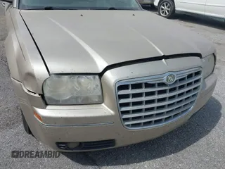 2006 Chrysler 300 Touring with VIN 2C3KA53G56H309497, listed as a IAAI auction lot 41792324 with 128,492 mi miles. Bid and sale history available at carsss.com. Image 6.