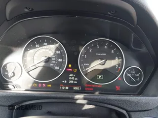 2013 BMW 3 Series 328i with VIN WBA3C1C54DK103415, listed as a IAAI auction lot 42147590 with 113,188 mi miles and . Bid and sale history available at carsss.com. Image 7.