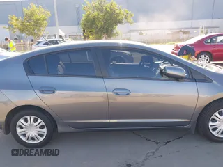 2010 Honda Insight LX with VIN JHMZE2H50AS019740, listed as a IAAI auction lot 41665527 with 74,022 mi miles and . Bid and sale history available at DreamBid. Image 13.