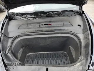 2025 Tesla Model Y Long Range with VIN 7SAYGDED4SF242721, listed as a Copart auction lot 56159955 with 7,131 mi miles and Salvage Title. Bid and sale history available at DreamBid. Image 12.