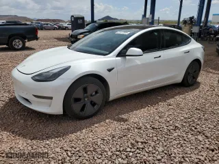 2023 Tesla Model 3 with VIN 5YJ3E1EA1PF587889, listed as a Copart auction lot 51977595 with 58,795 mi miles and Salvage Title. Bid and sale history available at carsss.com. Image 1.