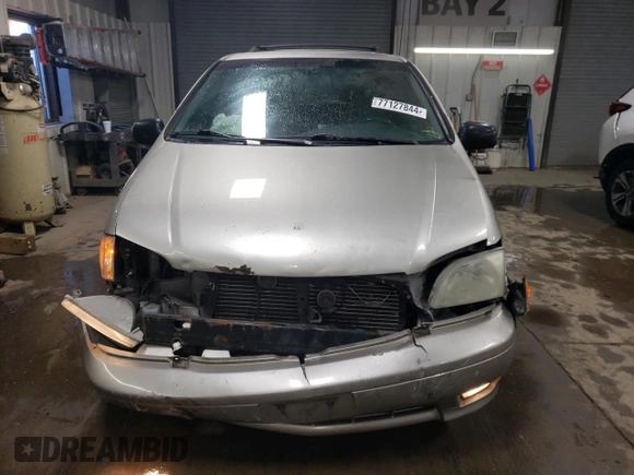 2002 Toyota Sienna LE with VIN 4T3ZF13C02U446097, listed as a Copart auction lot 77127844 with 182,873 mi miles and Salvage Title. Bid and sale history available at carsss.com. Image 5.