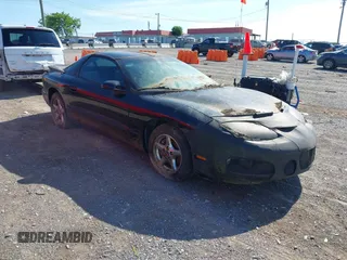 2001 Pontiac Firebird Formula z VIN 2G2FV22G512149316, wystawiony jako IAAI lot #42322668 z przebiegiem 109 585 mil mil oraz . Historia ofert i sprzedaży dostępna na DreamBid. Obrazek 1.