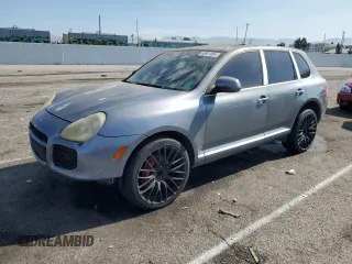 2005 Porsche Cayenne Turbo with VIN WP1AC29P65LA91187, listed as a Copart auction lot 65861054 with 186,084 mi miles and Salvage Title. Bid and sale history available at carsss.com. Image 1.