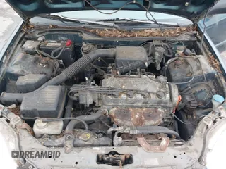1997 Honda Civic DX with VIN 1HGEJ6128VL023684, listed as a IAAI auction lot 41502999 with 140,871 mi miles. Bid and sale history available at carsss.com. Image 10.