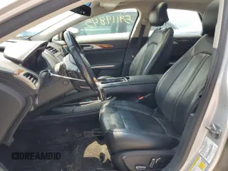 2016 Lincoln MKZ z VIN 3LN6L2JK1GR617572, wystawiony jako Copart lot #59119845 z przebiegiem 155 191 mil mil oraz Szkoda całkowita • Salvage title. Historia ofert i sprzedaży dostępna na DreamBid. Obrazek 7.