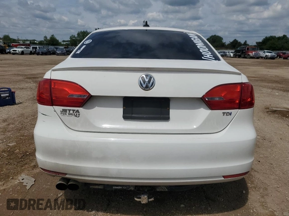 2012 Volkswagen Jetta TDI w/Premium & Nav with VIN 3VWLL7AJ4CM360634, listed as a Copart auction lot 58619355 with 171,903 mi miles and Salvage title. Bid and sale history available at DreamBid. Image 6.