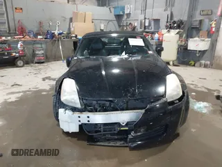 2004 Nissan 350Z Touring with VIN JN1AZ36AX4T014409, listed as a IAAI auction lot 41610945 with 86,756 mi miles. Bid and sale history available at carsss.com. Image 12.