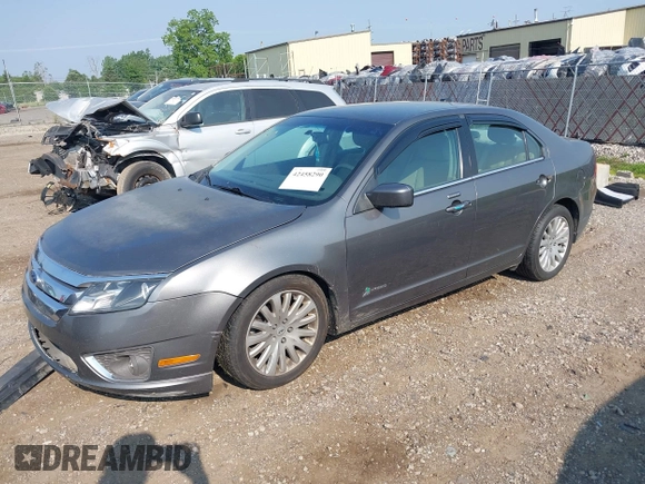 2011 Ford Fusion Hybrid with VIN 3FADP0L34BR253253, listed as a IAAI auction lot 42458290 with 137,110 mi miles and . Bid and sale history available at DreamBid. Image 2.