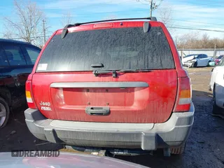 2003 Jeep Grand Cherokee Laredo with VIN 1J4GX48S13C594893, listed as a IAAI auction lot 41688597 with 179,680 mi miles. Bid and sale history available at carsss.com. Image 17.