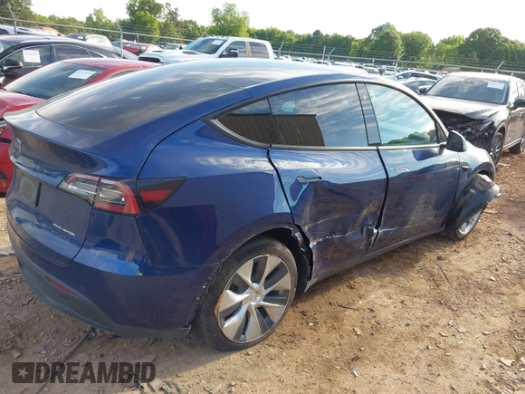 2022 Tesla Model Y Long Range z VIN 7SAYGDEE0NF429399, wystawiony jako IAAI lot #42333630 z przebiegiem 32 937 mil mil oraz . Historia ofert i sprzedaży dostępna na DreamBid. Obrazek 4.