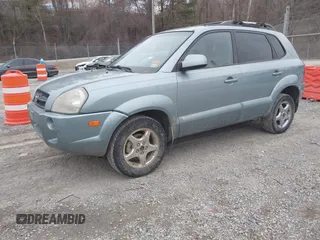 2007 Hyundai Tucson SE with VIN KM8JN12D27U606152, listed as a IAAI auction lot 41465051 with 141,478 mi miles. Bid and sale history available at carsss.com. Image 2.