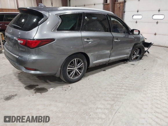 2017 Infiniti QX60 with VIN 5N1DL0MM1HC528514, listed as a IAAI auction lot 41986931 with 90,033 mi miles and . Bid and sale history available at DreamBid. Image 4.