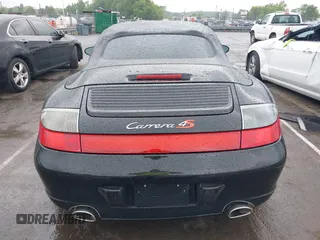 2005 Porsche 911 Carrera z VIN WP0CA299X5S650179, wystawiony jako IAAI lot #42123937 z przebiegiem 52 437 mil mil oraz . Historia ofert i sprzedaży dostępna na DreamBid. Obrazek 16.