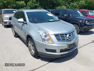 2015 Cadillac SRX Luxury Collection z VIN 3GYFNBE35FS627640, wystawiony jako IAAI lot #42262843 z przebiegiem 211 669 mil mil oraz . Historia ofert i sprzedaży dostępna na DreamBid. Obrazek 1.