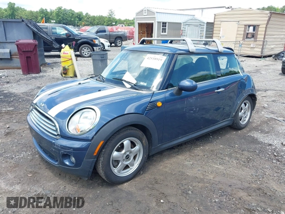 2009 MINI Hardtop with VIN WMWMF33509TU74290, listed as a IAAI auction lot 42538919 with 104,209 mi miles and . Bid and sale history available at DreamBid. Image 17.