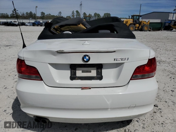 2010 BMW 1 Series 128i with VIN WBAUN1C5XAVH81789, listed as a Copart auction lot 49798465 with 128,859 mi miles and Clean title. Bid and sale history available at DreamBid. Image 6.