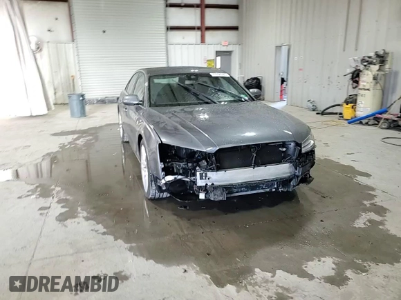 2015 Audi A8 z VIN WAUJGAFDXFN008499, wystawiony jako Copart lot #87658385 z przebiegiem 103 175 mil mil oraz Szkoda całkowita • Salvage title. Historia ofert i sprzedaży dostępna na DreamBid. Obrazek 14.