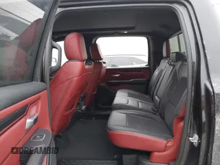 2019 Ram 1500 Rebel z VIN 1C6SRFLT6KN599362, wystawiony jako IAAI lot #41560018 z przebiegiem Nie podano mil oraz . Historia ofert i sprzedaży dostępna na DreamBid. Obrazek 8.