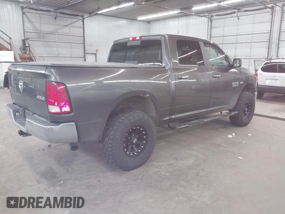 2015 Ram 1500 Big Horn with VIN 1C6RR7LTXFS656240, listed as a IAAI auction lot 41877628 with 148,136 mi miles and . Bid and sale history available at DreamBid. Image 4.
