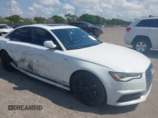 2016 Audi A6 3.0T Premium Plus with VIN WAUFGAFC9GN003664, listed as a IAAI auction lot 41890962 with 100,485 mi miles. Bid and sale history available at carsss.com. Image 1.