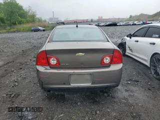 2011 Chevrolet Malibu 1LS with VIN 1G1ZB5E10BF200563, listed as a Copart auction lot 56359625 with 130,820 mi miles and Salvage Title. Bid and sale history available at DreamBid. Image 6.