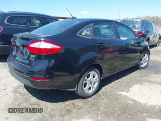 2016 Ford Fiesta SE with VIN 3FADP4BJ9GM144119, listed as a IAAI auction lot 41882179 with 122,048 mi miles. Bid and sale history available at carsss.com. Image 4.