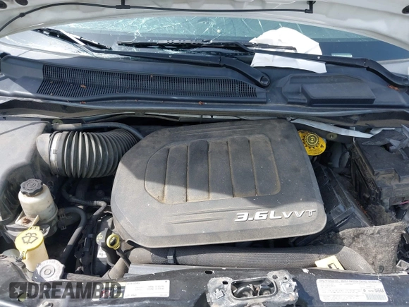 2013 Chrysler Town & Country S with VIN 2C4RC1HG6DR818396, listed as a IAAI auction lot 41922016 with 231,595 mi miles. Bid and sale history available at carsss.com. Image 10.