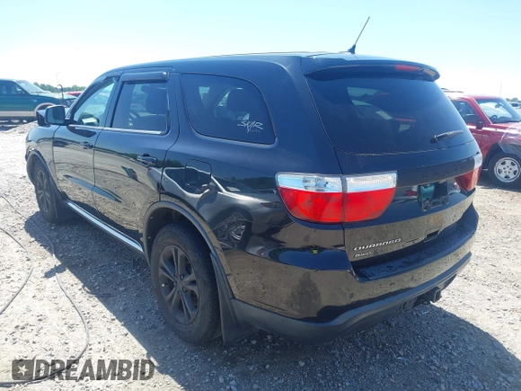 2013 Dodge Durango SXT with VIN 1C4RDJAG8DC617759, listed as a IAAI auction lot 42113300 with 185,152 mi miles and . Bid and sale history available at DreamBid. Image 3.