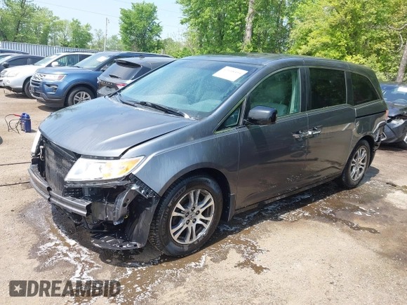 2012 Honda Odyssey EX-L with VIN 5FNRL5H67CB041252, listed as a IAAI auction lot 42158494 with 152,940 mi miles and . Bid and sale history available at DreamBid. Image 18.
